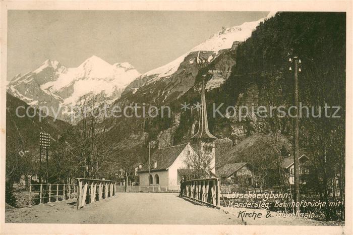 Kandersteg BE Loetschbergbahn Bahnhofbruecke mit Kirche und Bluemlisalp