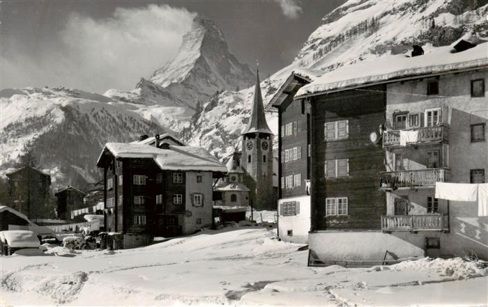 Zermatt VS Ortsmotiv mit Kirche Blick zum Matterhorn