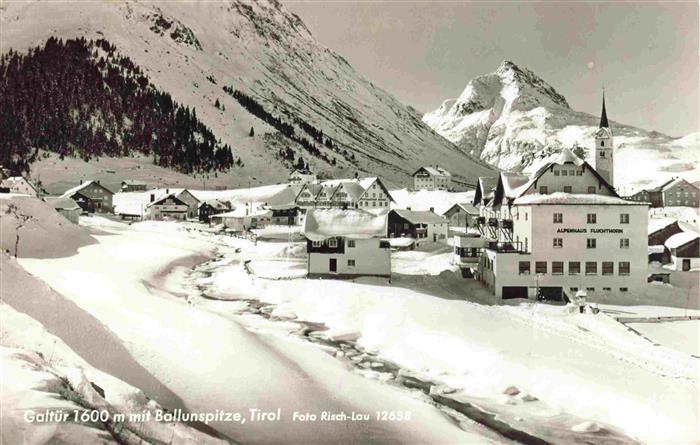 Galtuer Tirol AT Ortsansicht mit Kirche Winterpanorama mit Ballunspitze Alpen