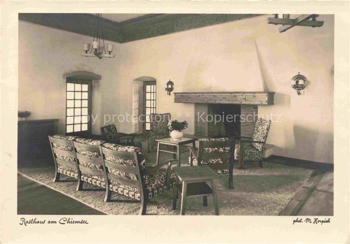Chiemsee Bayern Rasthaus am Chiemsee Kaminecke in der Hotelhalle