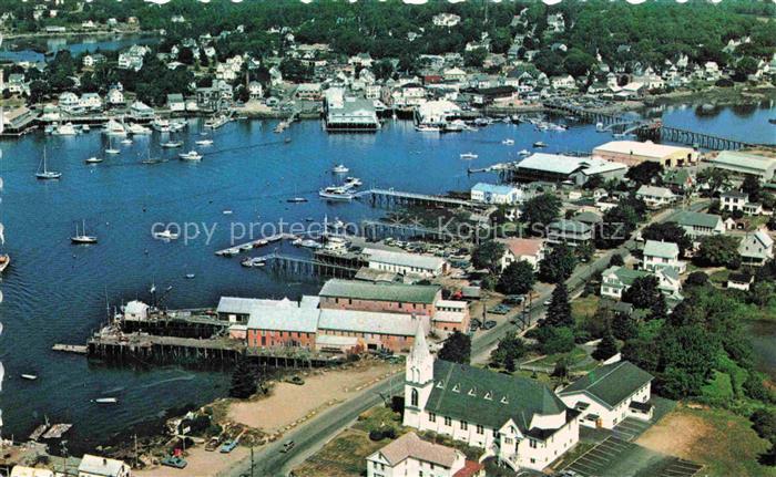 Boothbay-Harbor Maine USA Looking over Our Lady Queen of Peace and fishing wharf