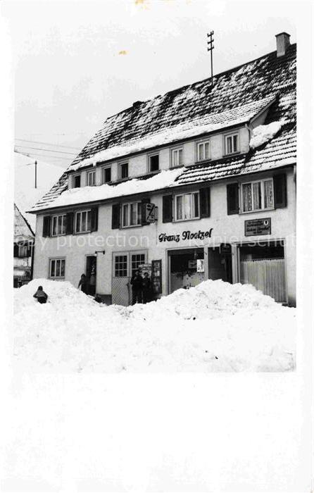 Wangen Allgaeu Bayern im Winter Friseursalon tiefverschneite Strassen