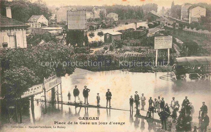 Gargan-Livry 93 Seine-Saint-Denis Place de la Gare un jour d'orage