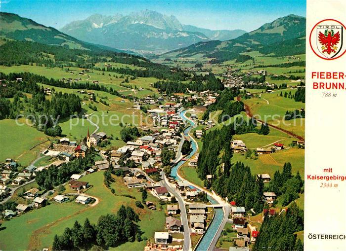 Fieberbrunn Tirol Fliegeraufnahme mit Kaisergebirge