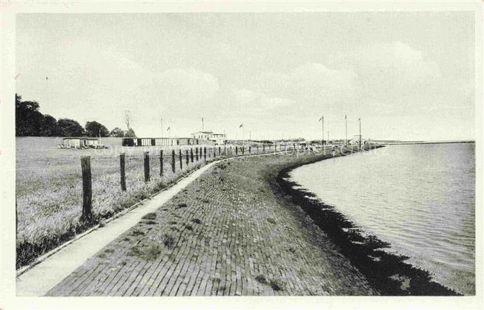 Burhave Nordseebad Niedersachsen Nordseebad Deichweg Strandgebaeude Flaggen Nord