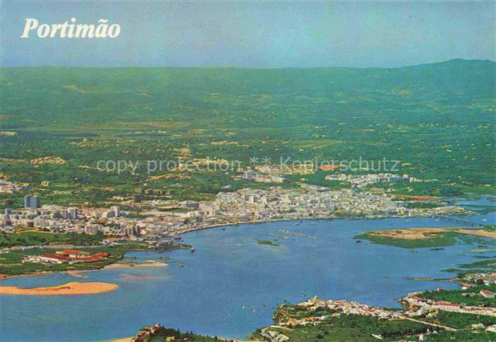 Portimao PT Stadtansicht Kueste Flussmuendung Atlantik Hafen Luftaufnahme