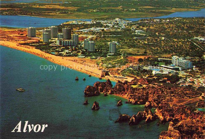 Alvor PT Strand Felsen Bucht Hotels Tourismus Klippen Luftaufnahme