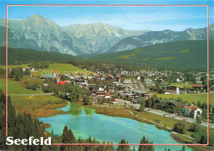 SEEFELD Tirol AT Wetterstein See Ortschaft Kirche Alpen Bergpanorama Luftaufnahm
