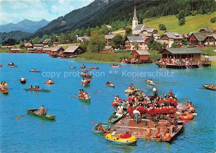 Weissensee Kaernten AT Flosskonzert der Trachtenkapelle Panorama