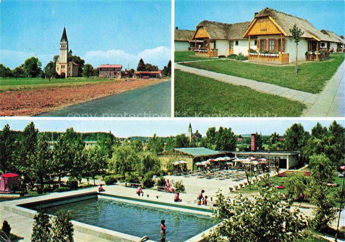 Moravci Slovenia Motiv mit Kirche Wohnhaeuser Freibad