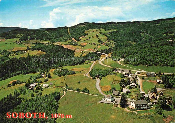 Soboth Steiermark AT Luftaufnahme Kirche Dorf Bundesstrasse-69 Wald Bergwiesen H
