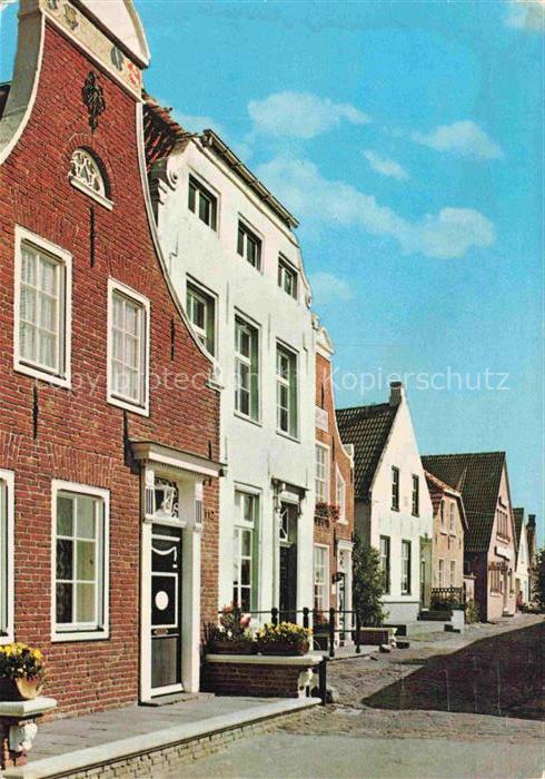 Greetsiel Krummhoern Aurich Niedersachsen Friesische-Haeuser Backsteingiebel Gas