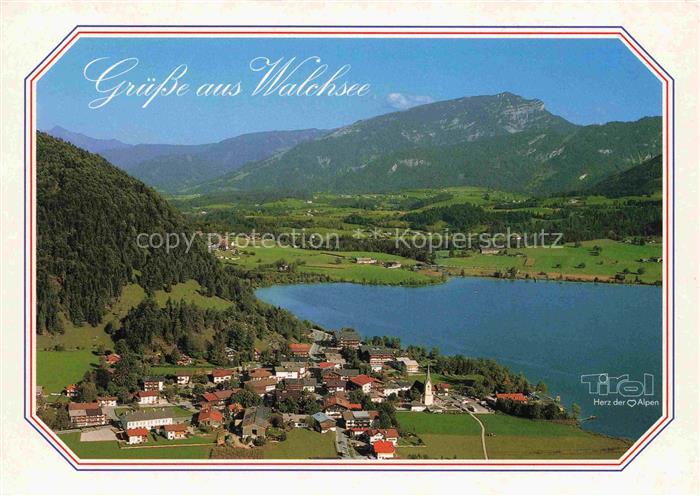 Walchsee Tirol AT Walchsee Kaiserwinkl See Ferienort Kirche Berge Wiesen Talblic