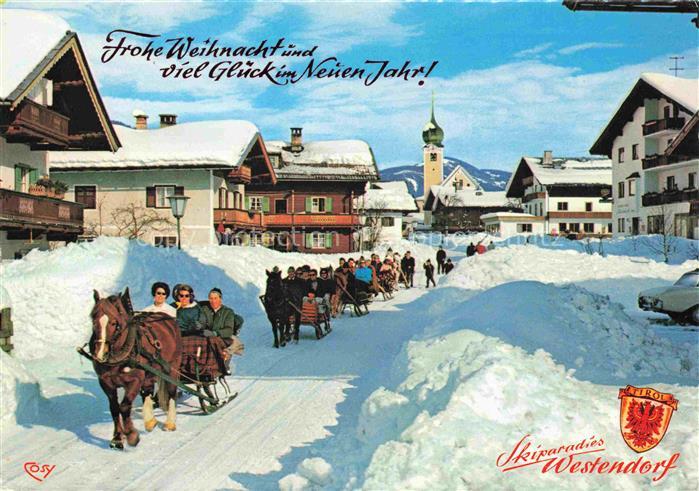 Westendorf Tirol AT Pferdeschlitten Winterszene Weihnachten Dorfstrasse Kirche S