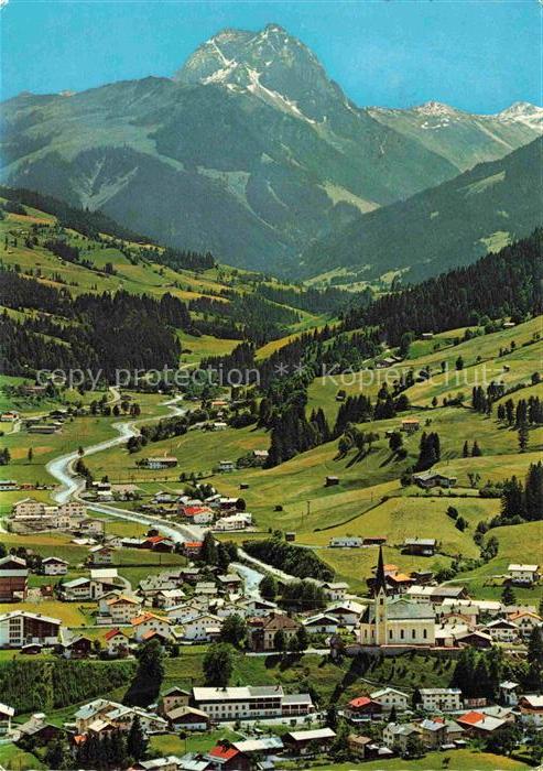 Kirchberg Tirol AT Rettenstein Panorama Tal Dorfansicht Kirche Bergwiesen Wald S