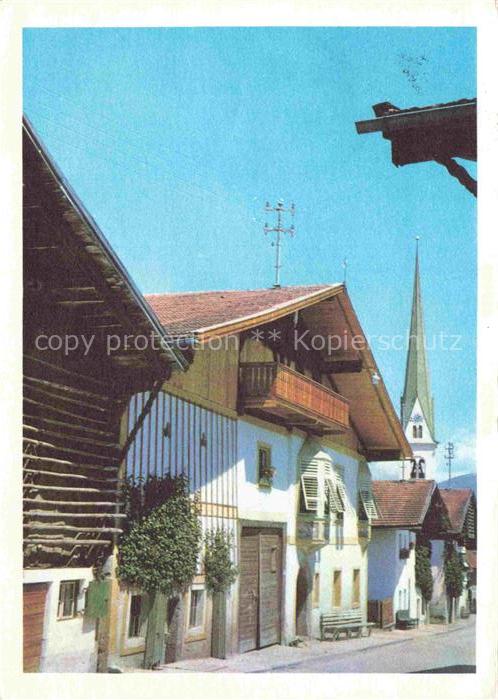 Mutters Innsbruck Tirol AT Dorfstrasse Bauernhaus Kirchturm Balkon Wetterfahne A