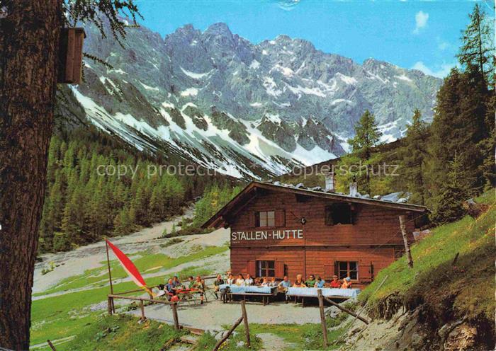 Stallenhuette 1350m Stans Unterinntal Tirol AT Berghuette Terrasse Wanderer Berg