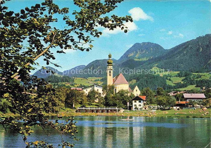 Brixlegg Tirol AT Kirche See Badeteich Berglandschaft Zwiebeltum Dorf Wiesen