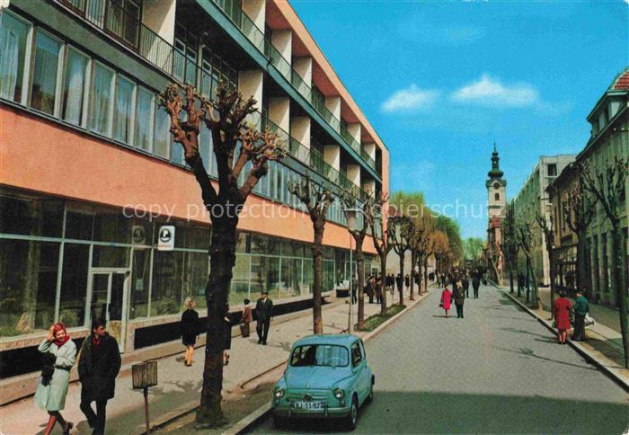 Bjelovar Croatia Hauptstrasse Fussgaenger Barockkirche Fiat-600 Baeume Geschaeft