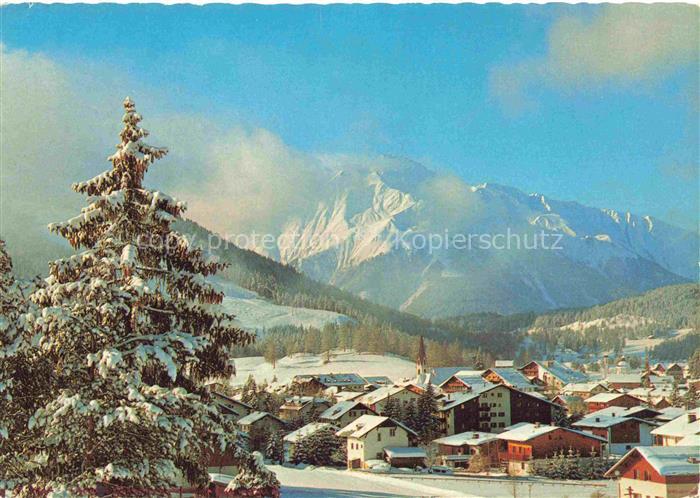 SEEFELD Tirol AT Winterlandschaft Bergdorf Kirchturm Schnee Hocheder Berge Tanne