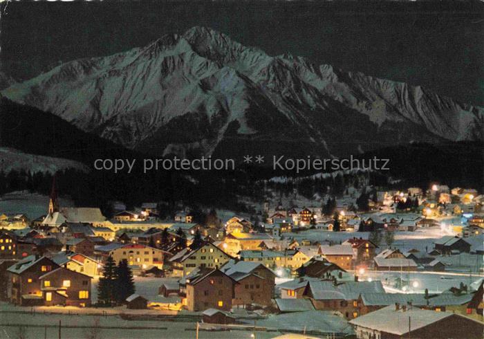 SEEFELD Tirol AT Winternacht Nachtaufnahme Hocheder Beleuchtung Schnee Bergdorf
