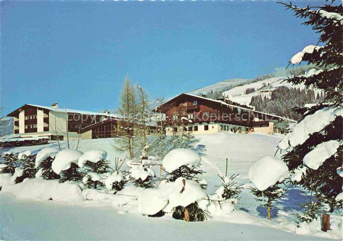 Kirchberg Tirol AT Alpenhof Hotel Schnee Skipiste Tannen Ferienanlage Wintersais