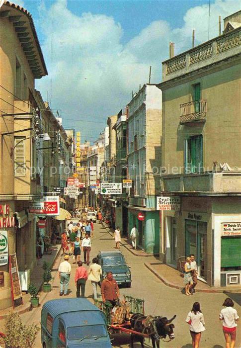 LLORET DE MAR Costa Brava ES Callejón-San-Pedro Gasse Geschaefte Passanten Auto