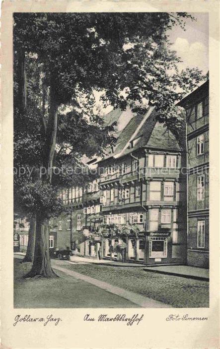 GOSLAR Harz Niedersachsen Am-Marktkirchof Fachwerkhaus Restaurant Baeume Kopfste