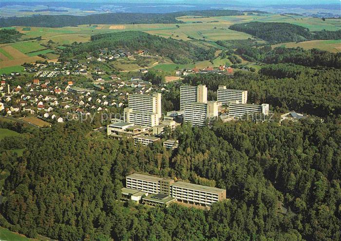 Neustadt Saale Bad Neustadt Bayern Rhoen-Klinikum Hochhaeuser Wald Luftaufnahme