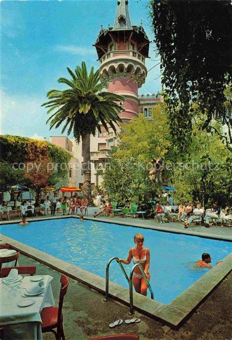 SITGES Costa Dorada ES Sitges-Park-Hotel Swimmingpool Turm Palmen Touristen Cost