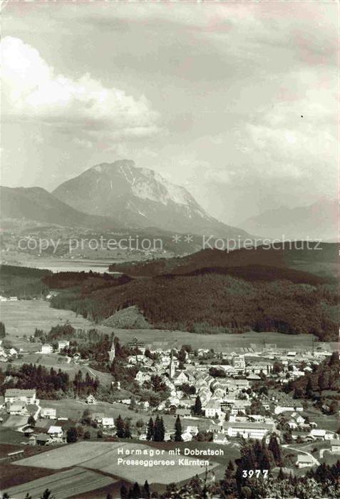 Hermagor Kaernten AT Dobratsch Presseggersee Panorama Ortschaft Kirche Bergmassi