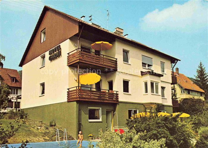 URACH Bad Reutlingen BW Hotel-garni-Baechi Schwimmerbecken Sonnenschirme Balkon