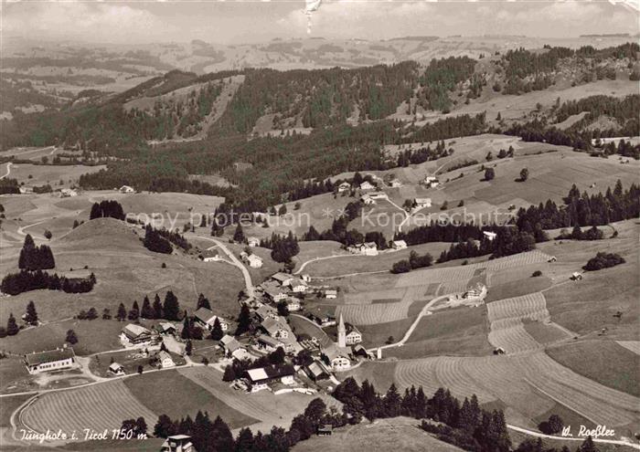 Jungholz Ausserfern Tirol AT Fliegeraufnahme Dorf Kirche Felder Wald Huegel 1150