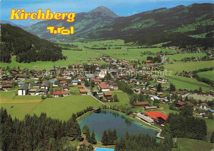 Kirchberg Tirol AT Luftbild Tal Kitzbuehler-Alpen See Schwimmbad Kirchturm Bergw