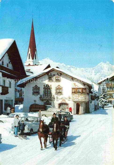 SEEFELD Tirol AT Wetterstein Dorfplatz Pferdeschlitten Kirche Lueftlmalerei Schn
