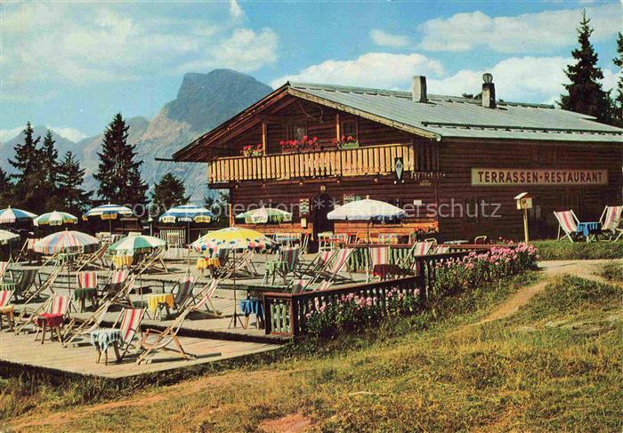 SEEFELD Tirol AT Gschwandtkopf Terrassen-Restaurant Liegestuehle Sonnenschirme B