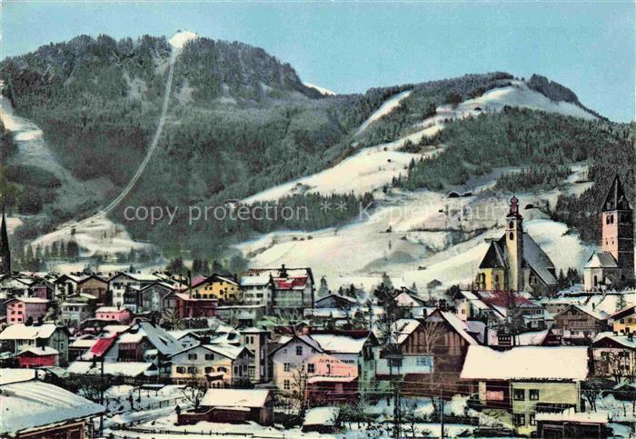 Kitzbuehel Tirol AT Hahnenkamm Winterlandschaft Kirche Ort Schnee Schigebiet Ski
