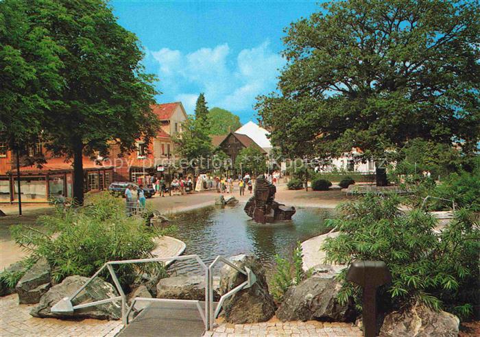 BAD HARZBURG Niedersachsen Berliner-Platz Teich Brunnen Passanten Geschaefte Bae