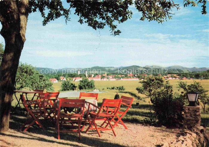 Neutrauchburg Isny Allgaeu Bayern Blick-auf-Isny Terrasse Tische Stuehle Wiesen