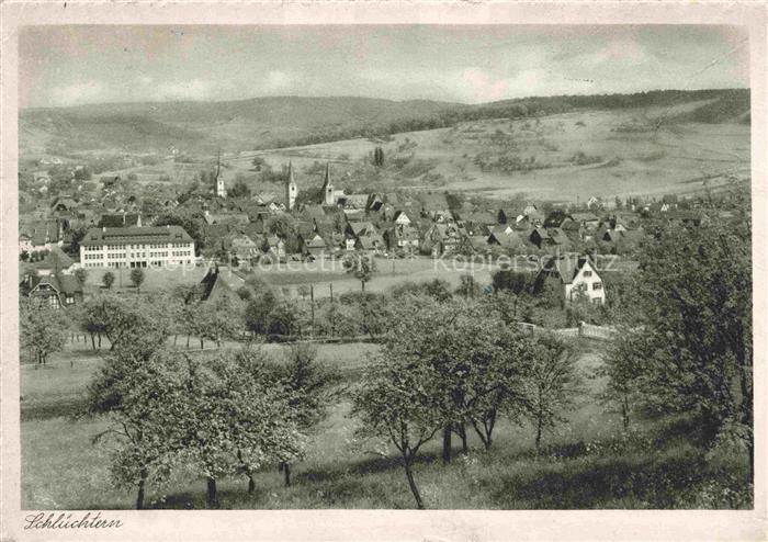Schluechtern Hessen Stadtansicht Kirche Ortschaft Huegel Baeume Felder