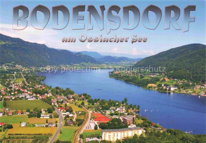 Bodensdorf Ossiacher See Kaernten AT Ossiacher-See Luftaufnahme See Berge Ortsch