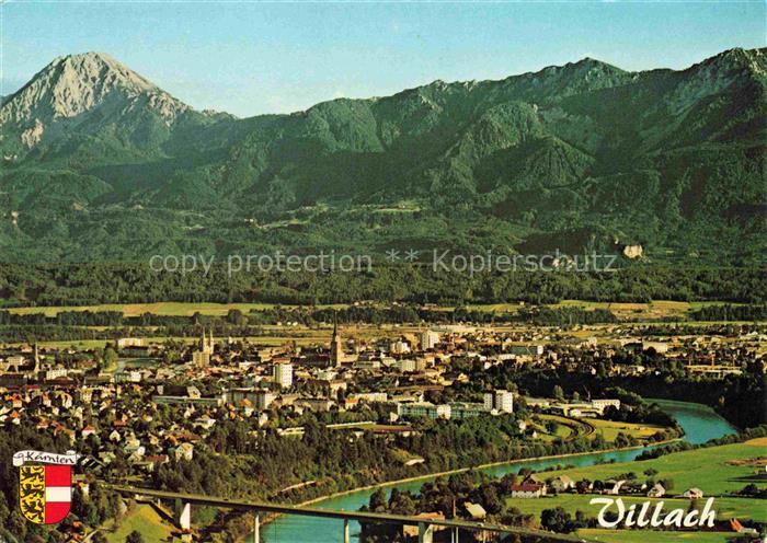 VILLACH Kaernten AT Mittagskogel Drau Bruecke Fliegeraufnahme Stadtpanorama Berg