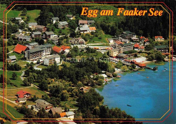 Egg Faakersee Kaernten AT Faakersee Luftbild See Ort Hotels Strand Boote Baeume