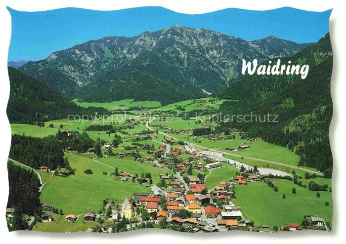 Waidring Tirol AT Fliegeraufnahme Bergdorf Talkessel Kirche Bergpanorama Wiesen