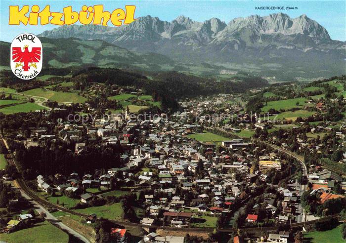 Kitzbuehel Tirol AT Fliegeraufnahme Stadtansicht Kaisergebirge Kirche Talkessel