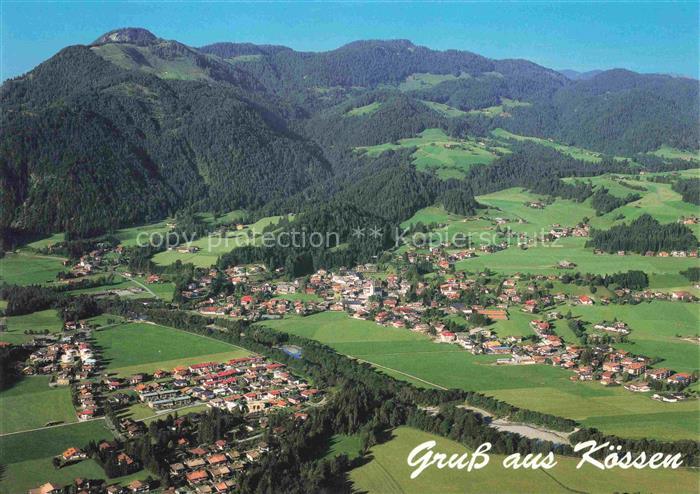 Koessen Tirol AT Gruss-aus Kaiserwinkl Luftaufnahme Dorf Berglandschaft Wiesen W