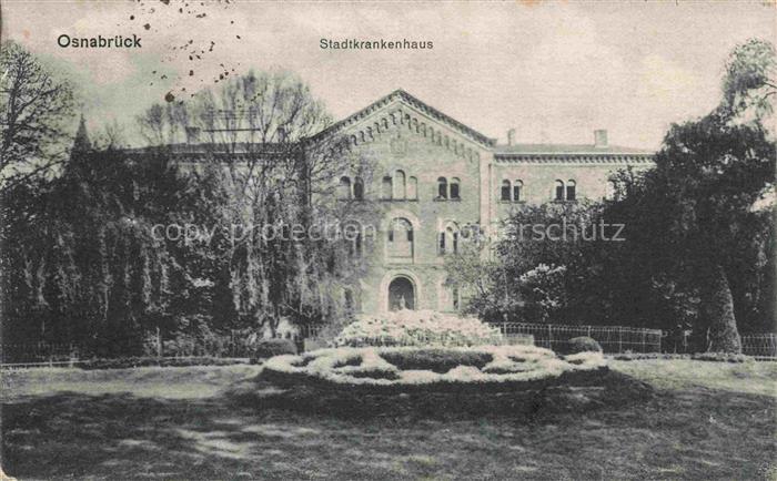Atter Stadtkrankenhaus Krankenhausgebaeude Garten Blumenbeet Baeume Parkanlage