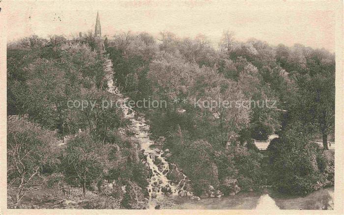 BERLIN CITY Viktoriapark Wasserfall Kirchturm Baeume Felsen Rathenowerstrasse
