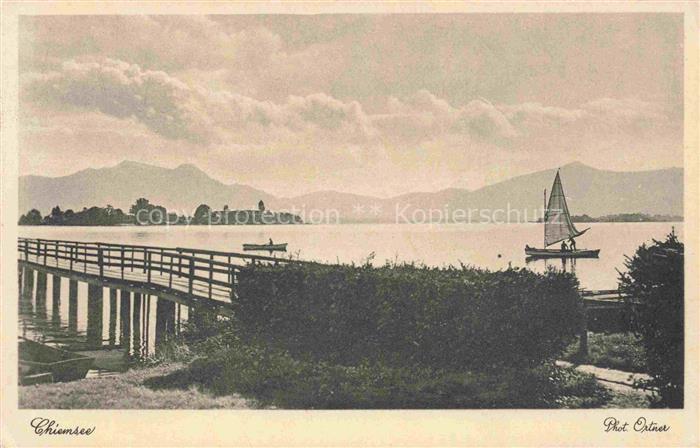 Chiemsee Bayern Segelboot Steg Frauenchiemsee Berge Chiemgauer-Alpen See Ufer