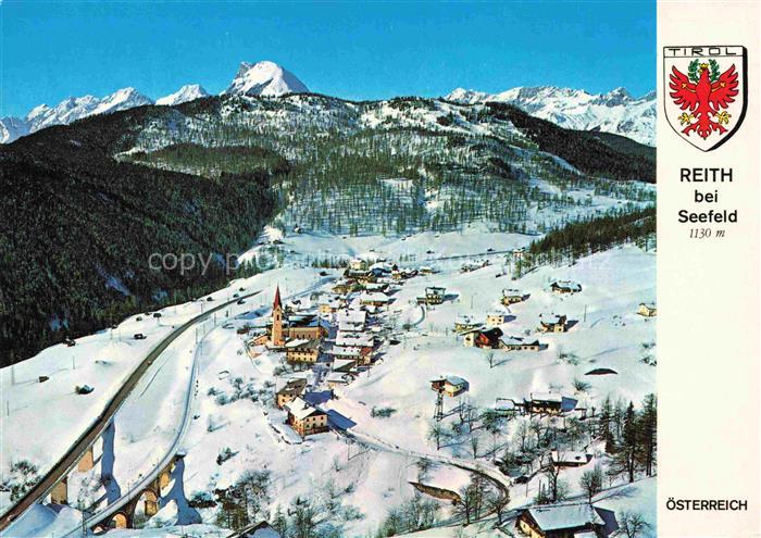 Reith Seefeld Tirol AT Fliegeraufnahme Winterlandschaft Schnee Berge Kirche Gsch